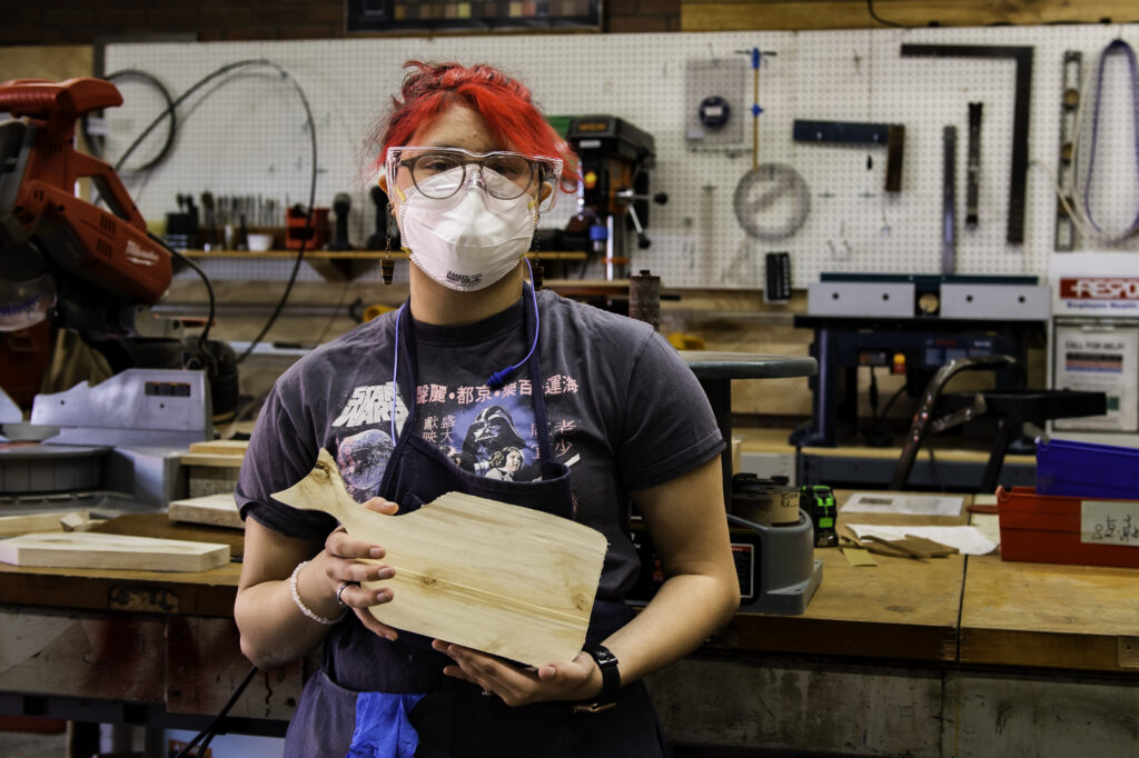 Bella showing off the cutting board she was working on! 